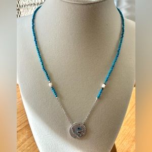 A handmade piece. Blue dolphin necklace for women or teens.